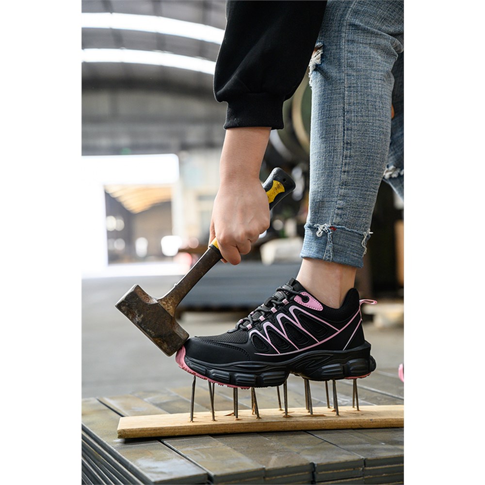 Steel toe impact scene for black and pink work shoe