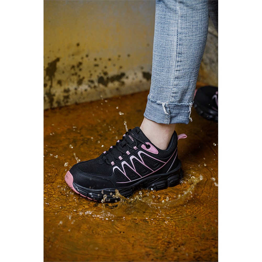 Black and pink slip resistant work shoe in wet floor scene