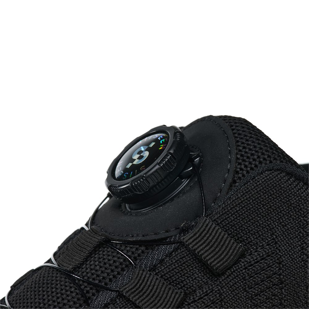 Close-up of dial lacing system on black work shoe