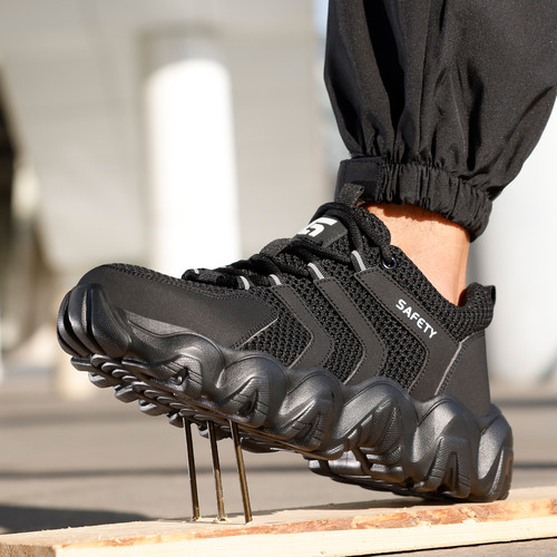 puncture-resistant midsole on black steel toe work shoes