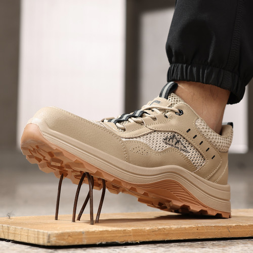 puncture-resistant midsole on khaki steel toe work shoes