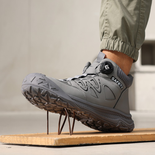puncture-resistant midsole on gray steel toe work shoes