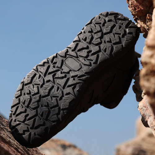 slip-resistant outsole on gray steel toe work shoes