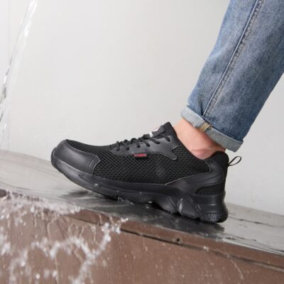 Slip-resistant work shoe on wet surface