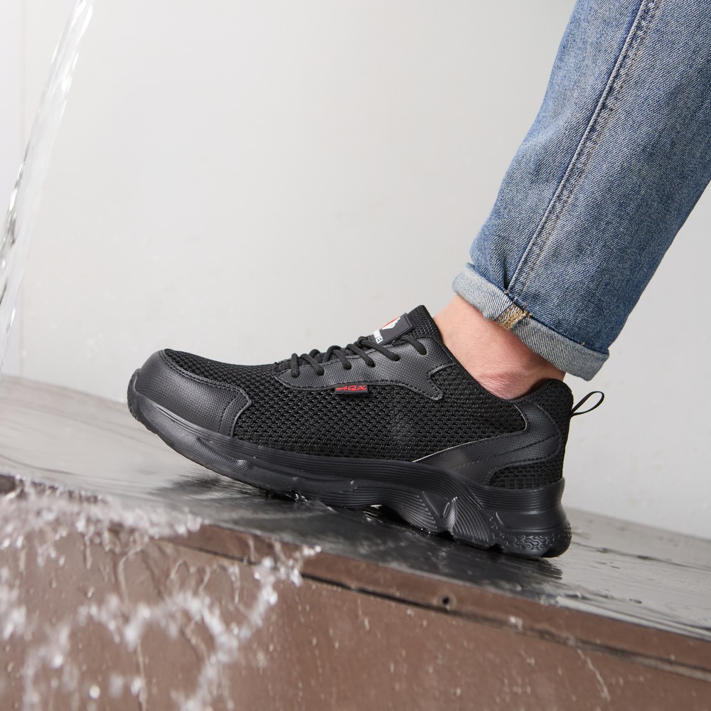 Slip-resistant work shoe on wet surface