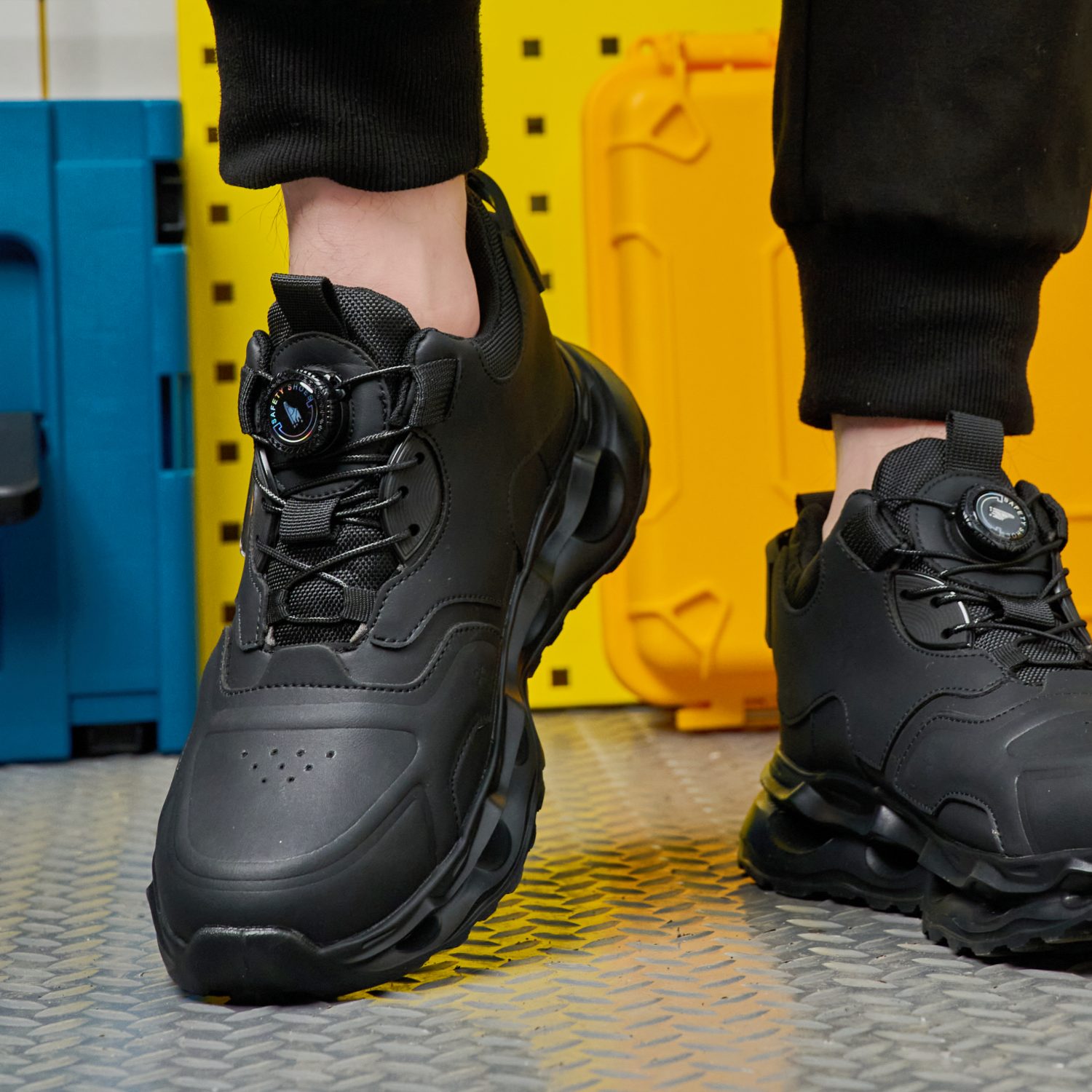 Quick dial lacing system on black work shoes