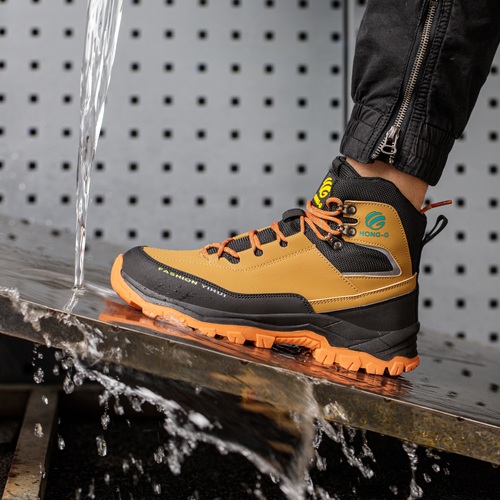 Slip resistant work boots on a wet surface