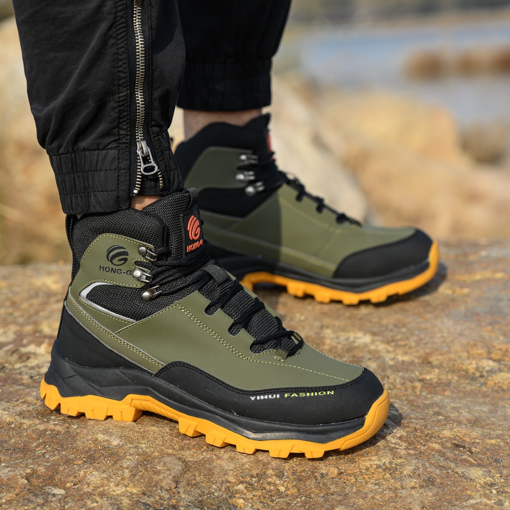 Olive Green steel toe boots in an outdoor work scene