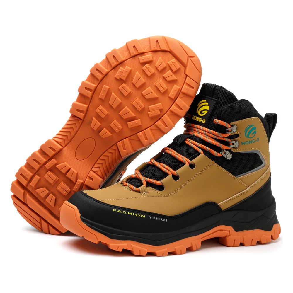 Outsole and upper view of tan/orange safety boots