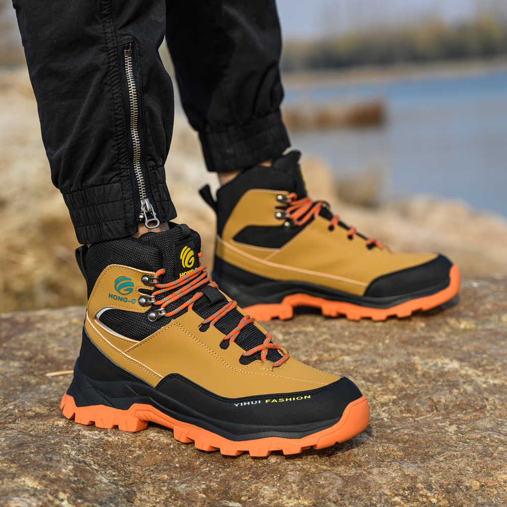 Tan/Orange steel toe boots in an outdoor work scene