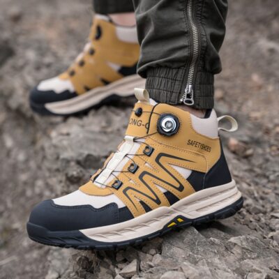Tan/Black steel toe boots in an outdoor work scene