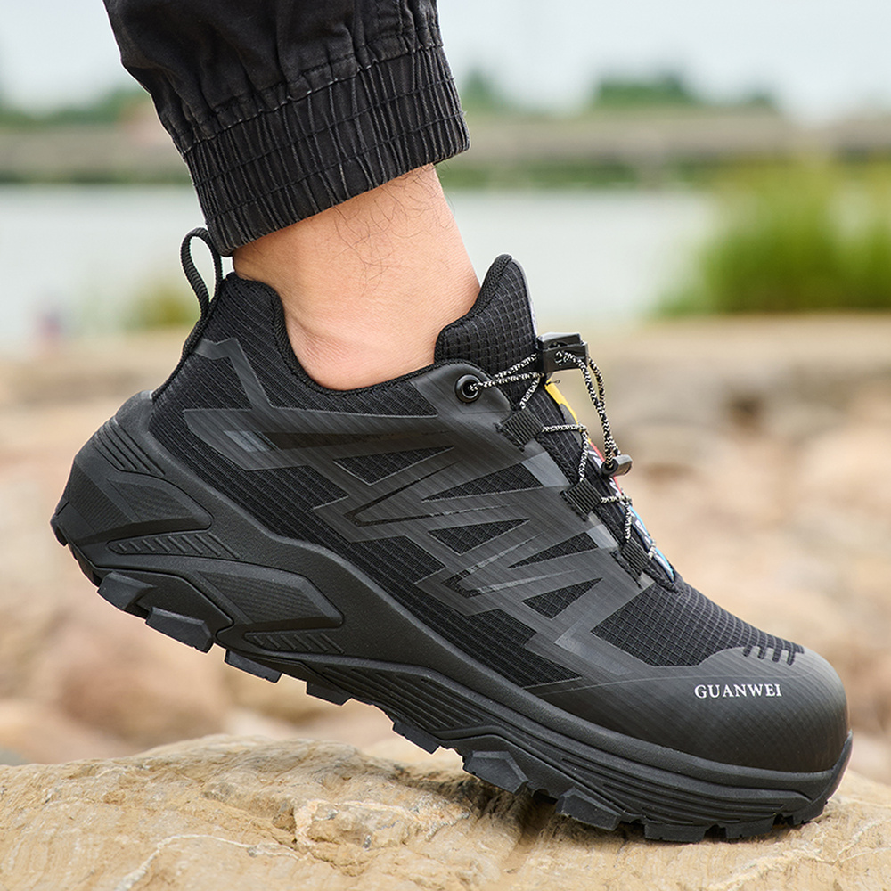 Black steel toe shoes in an outdoor work scene