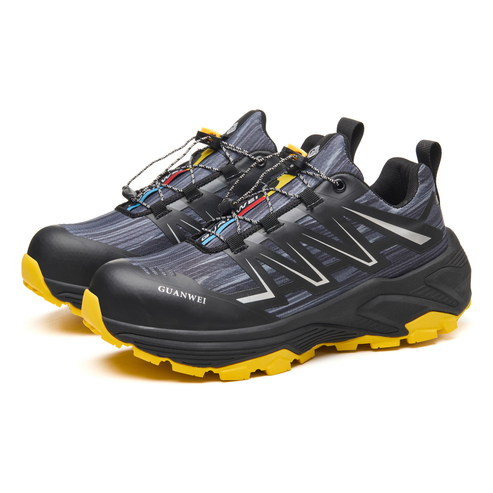 Outsole and upper view of black/yellow work shoes
