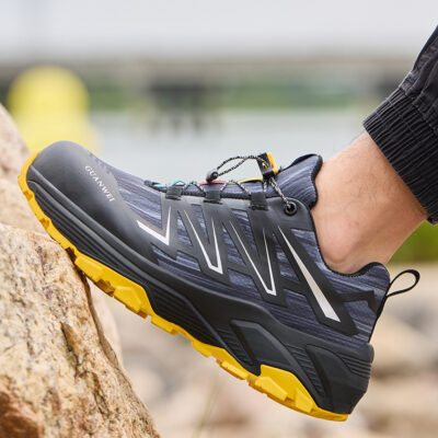 Black/Yellow slip resistant work shoes in an active job setting