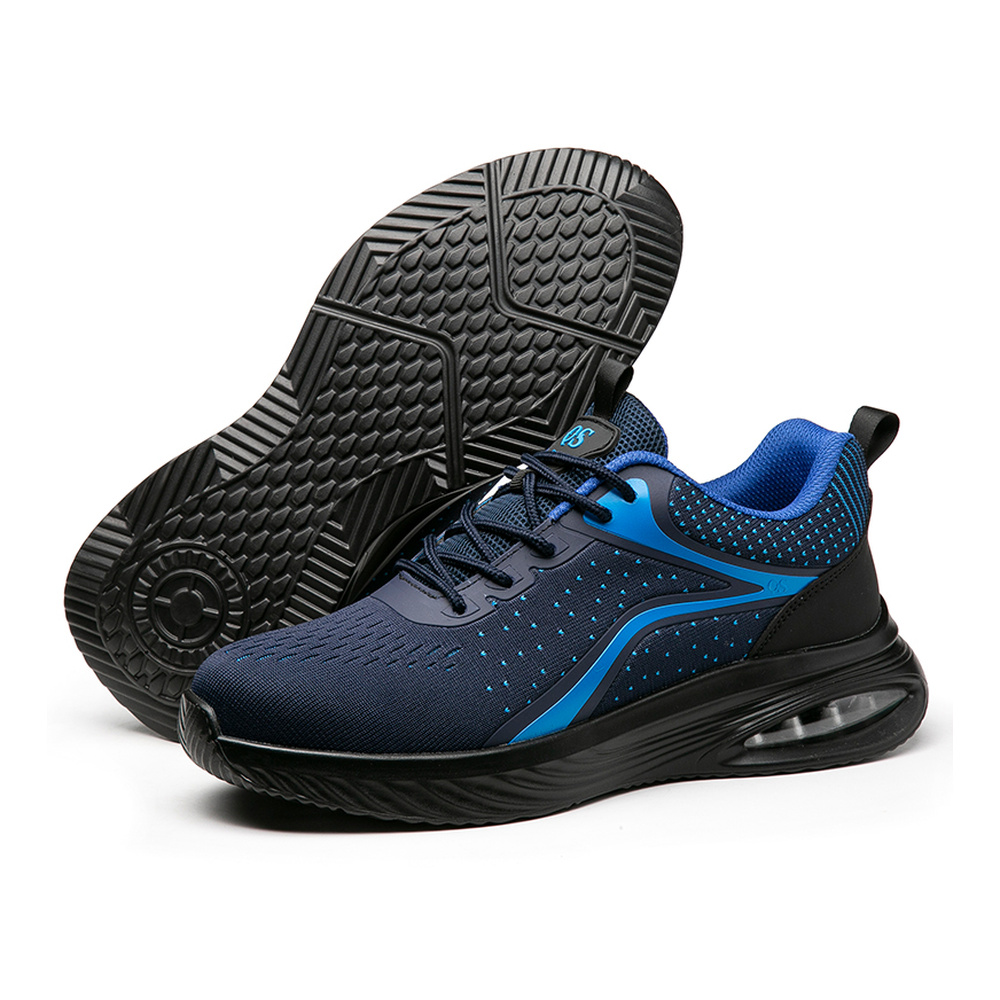 Deep tread outsole of navy/blue safety shoes