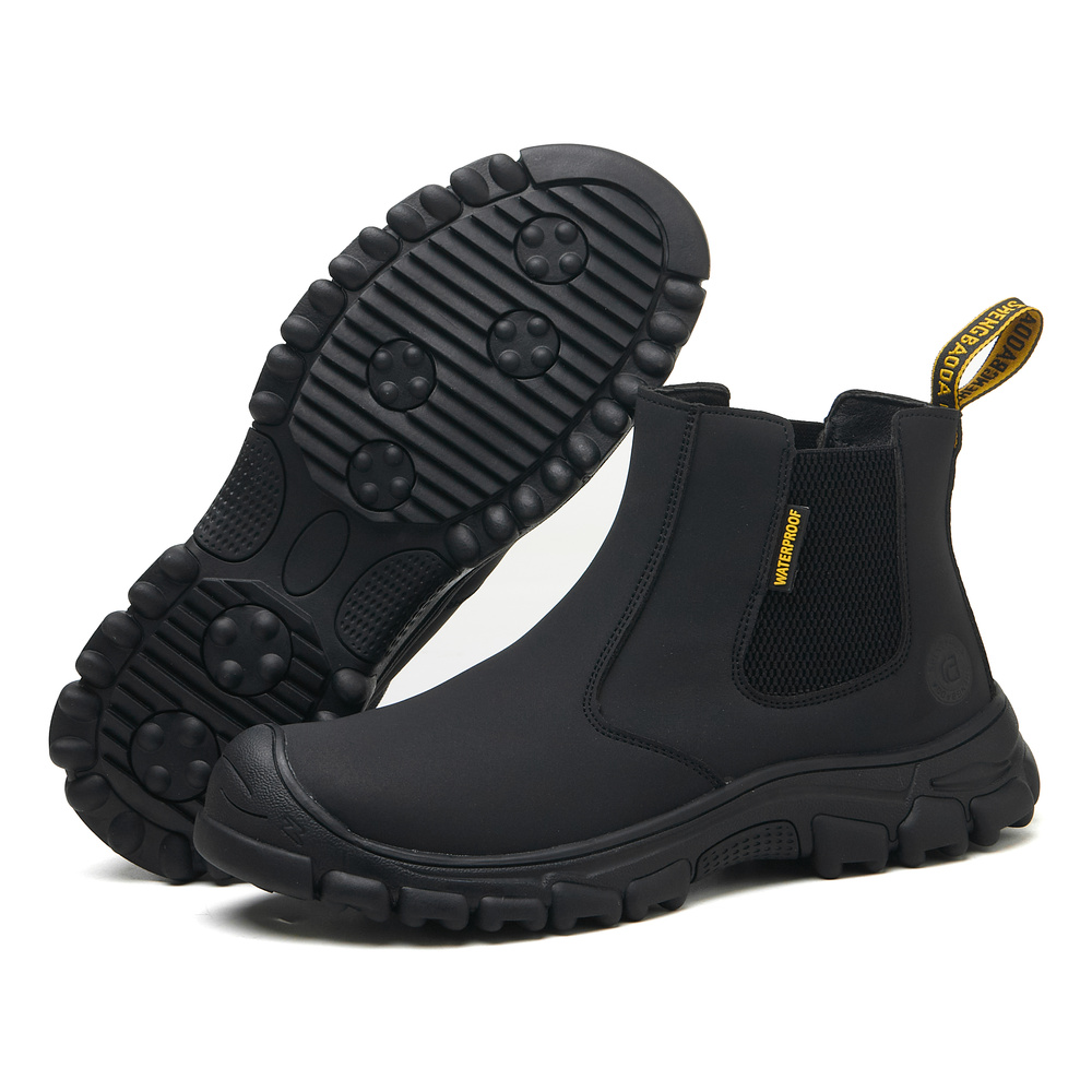 Black steel toe Chelsea work boots - outsole and upper view