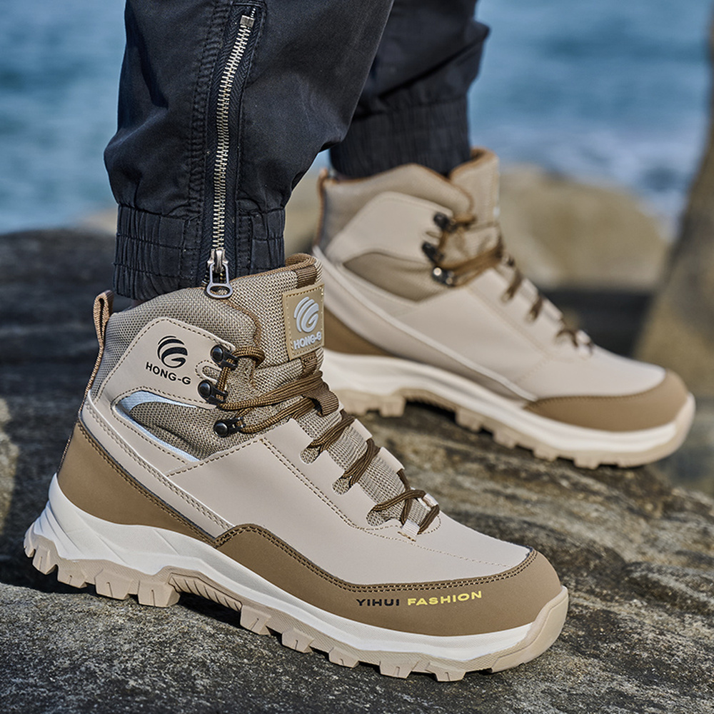 Beige steel toe boots in an outdoor work scene
