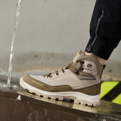 Beige slip resistant work boots in an active job setting