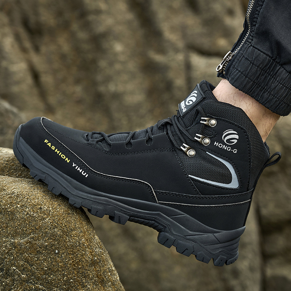 Black steel toe boots in an outdoor work scene