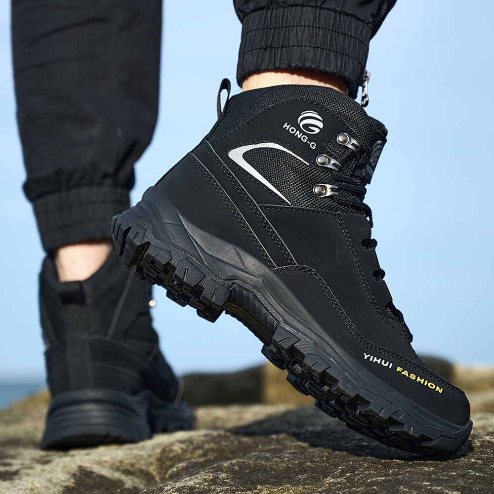 Black slip resistant work boots in an active job setting