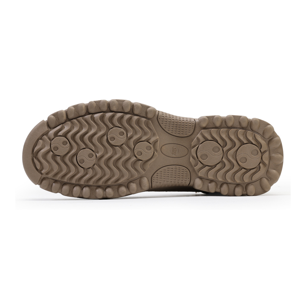 Deep tread outsole on tan winter work shoe