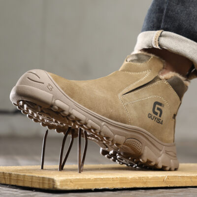 Tan puncture-resistant steel toe work shoe on nails