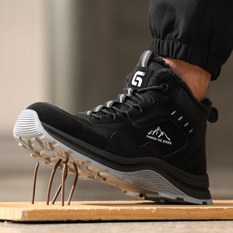 Puncture resistant midsole on black steel toe safety boots