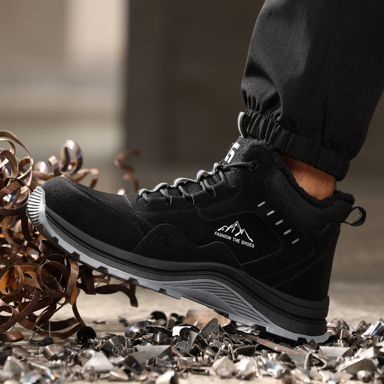 Deep tread traction outsole on black winter work boots