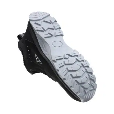 Rugged segmented outsole on black steel toe boot