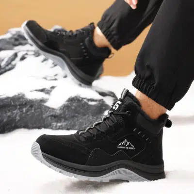 Black fleece lined steel toe boots in snow