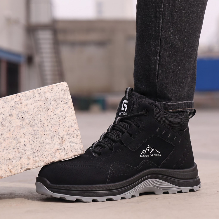 Composite toe impact protection in black metal free work boots