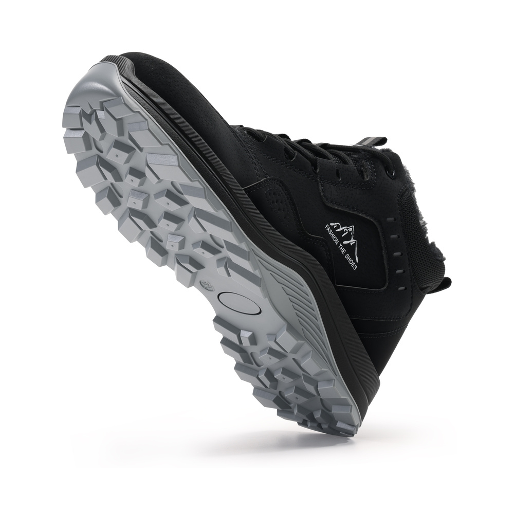 Rugged outsole angle on black composite toe work boot