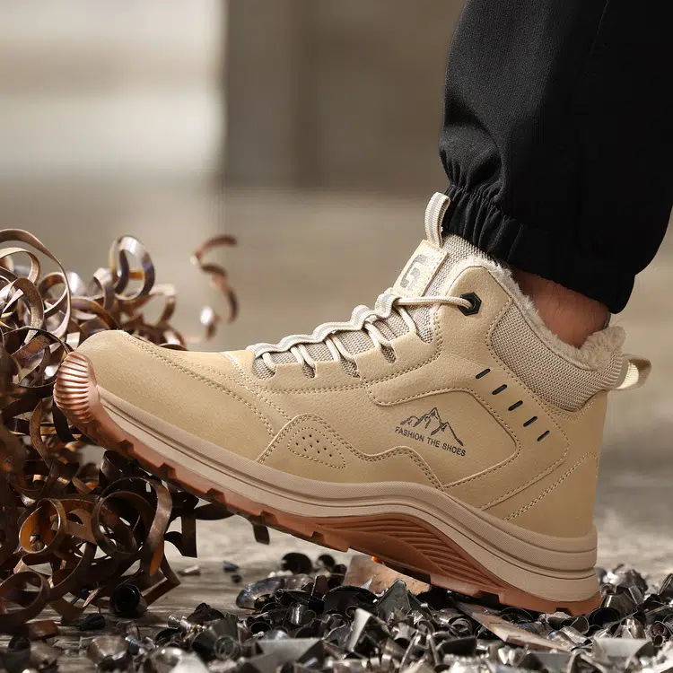 Deep tread traction outsole on beige winter work boots