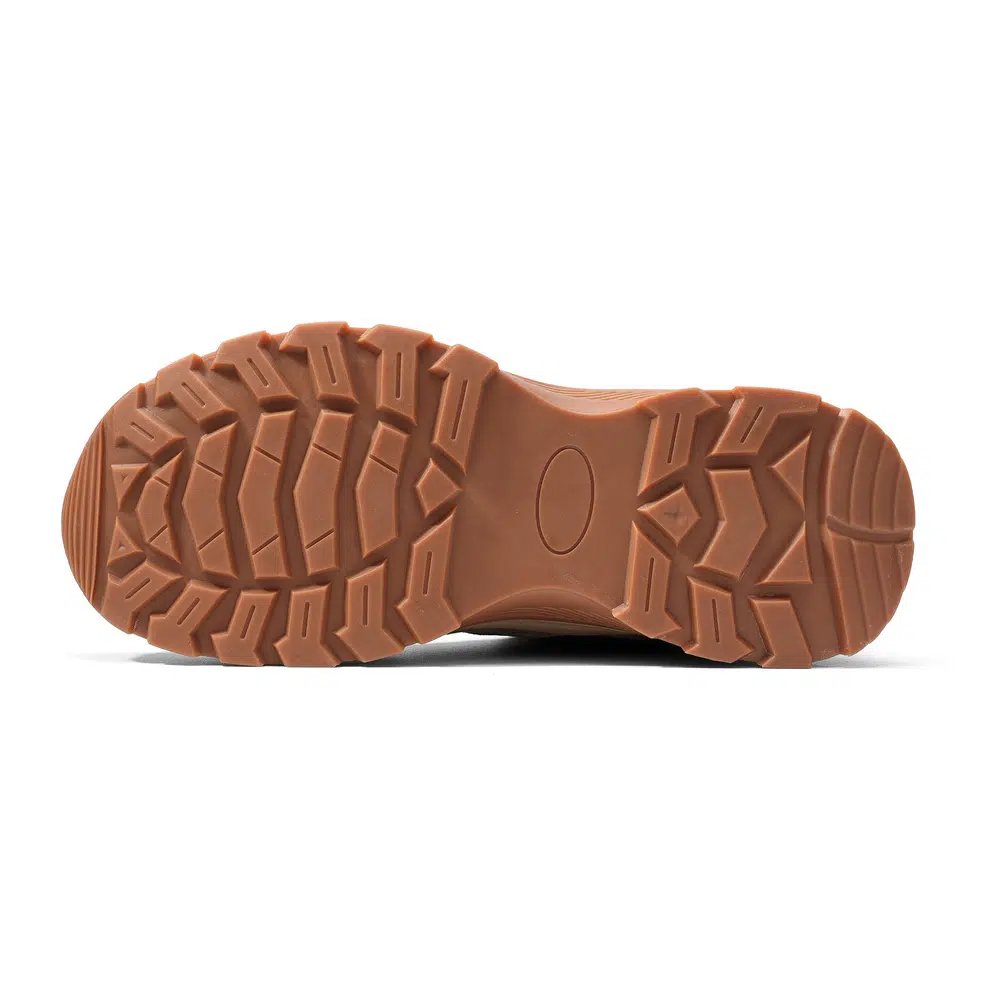 Deep tread outsole on beige winter safety boot