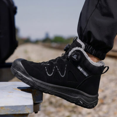 Black composite toe work boot in outdoor work setting
