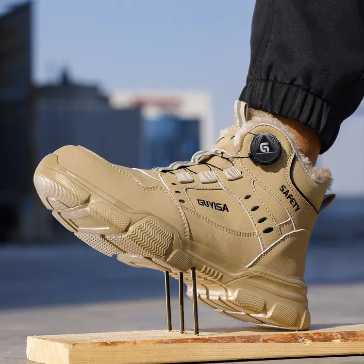 Puncture resistant midsole on tan steel toe work boots